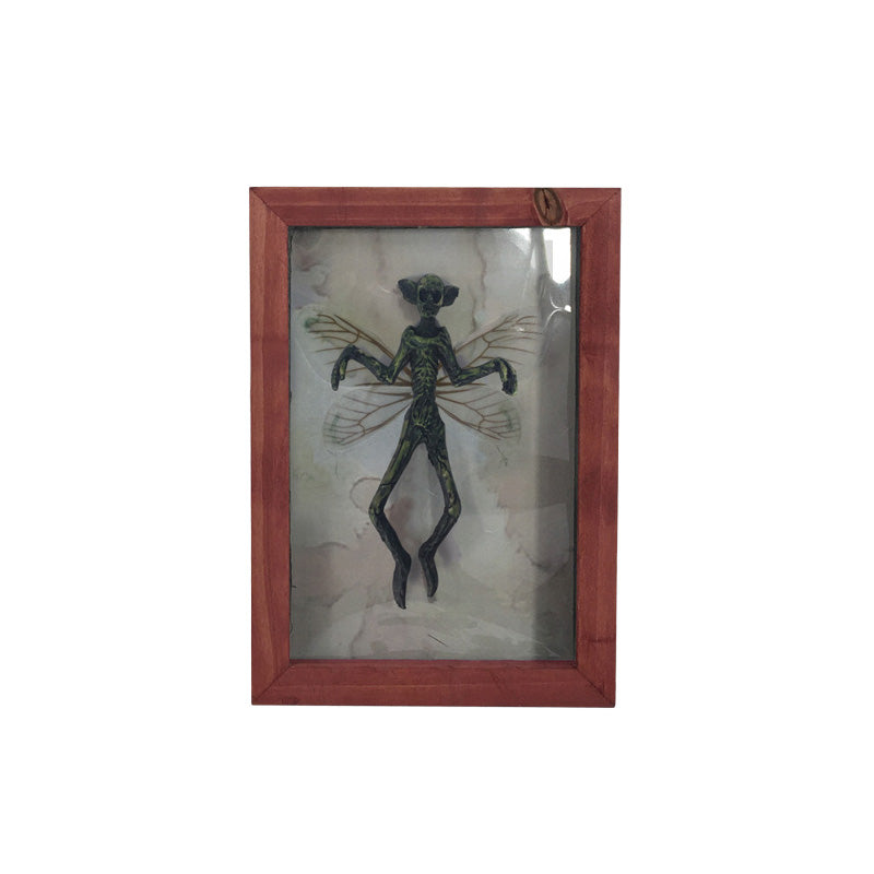 Mysterious Mummified Fairy in Frame